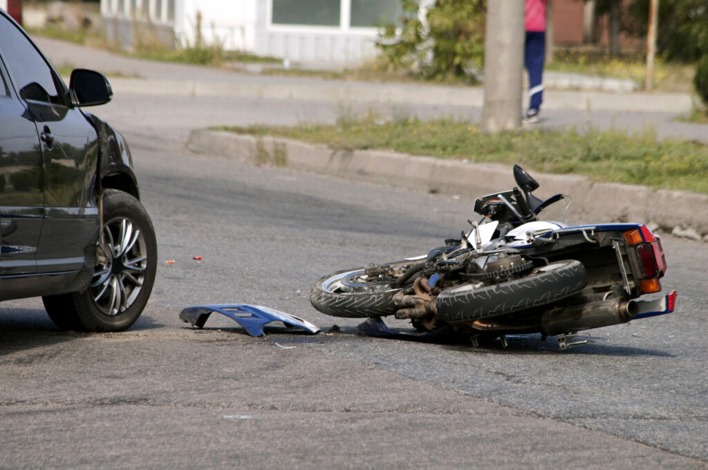 Motorcycle lays on it's side on a Jonesboro road after an SUV crashed into it.